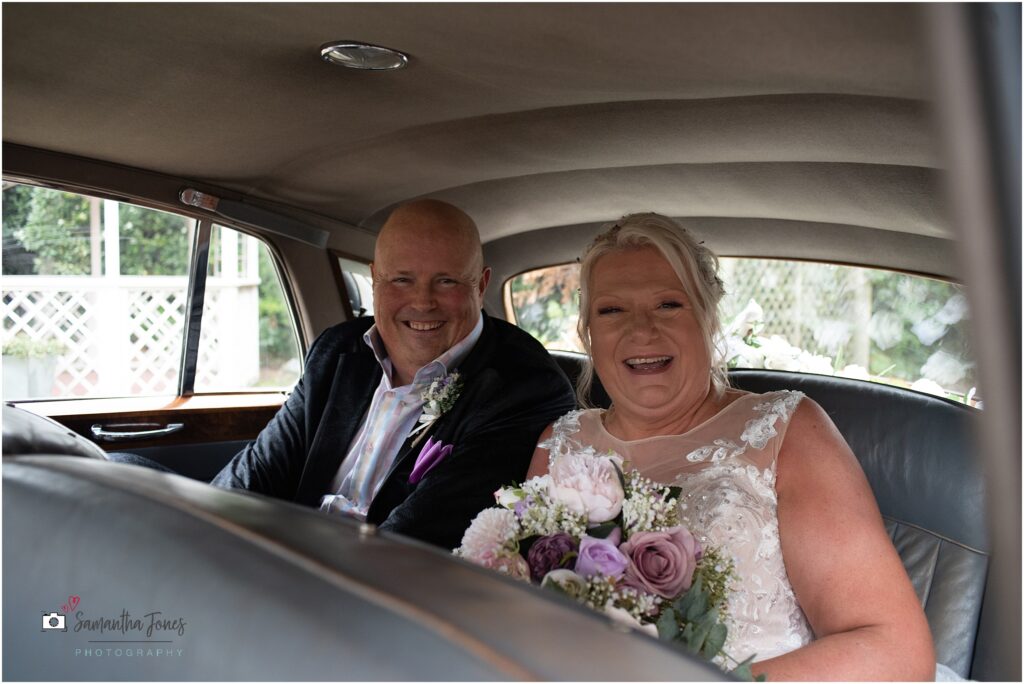 Wedding couple leaving Aberdeen House in Big Day Cars Bentley S2