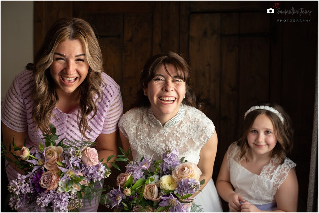 Bride, bridesmaid and flower girl